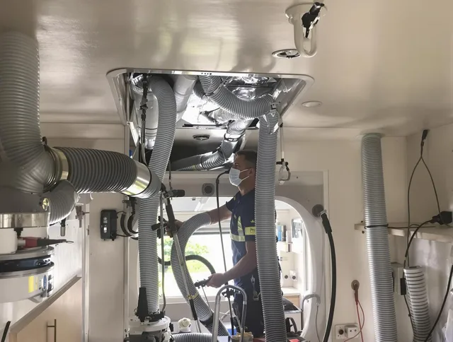 Wrentham Air Duct Cleaning specialist performing precise mobile home duct cleaning in Wrentham